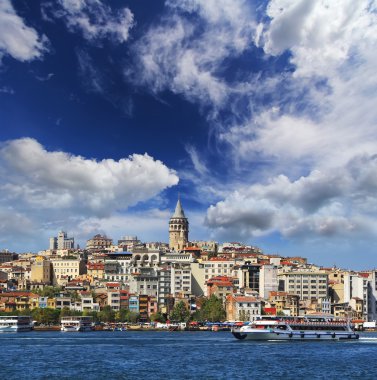 Istanbul seaside. Buildings reflect in the water. Travel concept