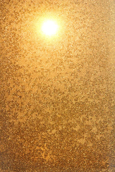 Golden Sunset Through Frost Pattern on a Window. Winter concept. Natural background — Stock Photo, Image