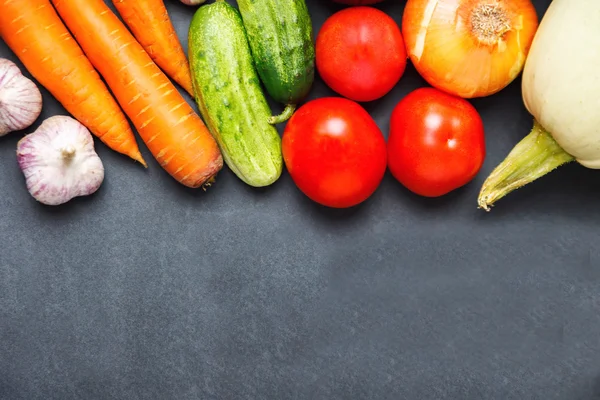 Healthy Organic Vegetables on a dark Background. Art Border Design. empty space