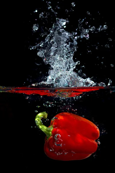 Pepper in water — Stock Photo, Image