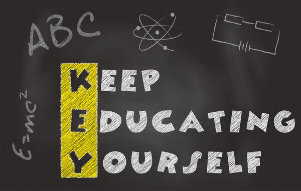 Acronym Of Key Over Black Chalkboard. Keep Educating Yourself Slogan