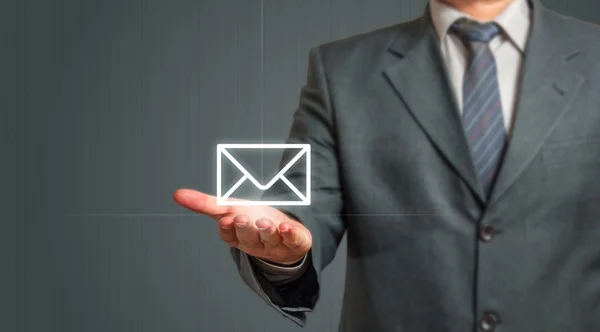 Homem de negócios Apresentando Email Ícone — Fotografia de Stock