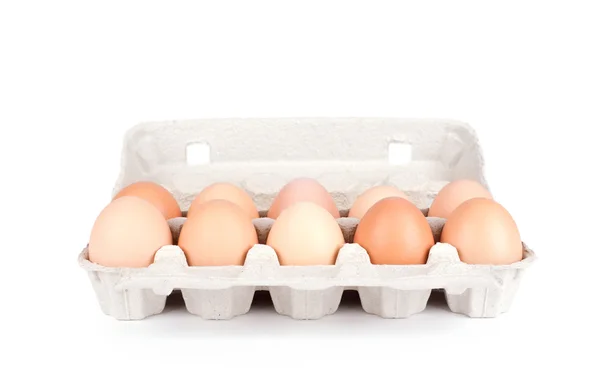 Dez ovos em embalagem de cartão isolados — Fotografia de Stock