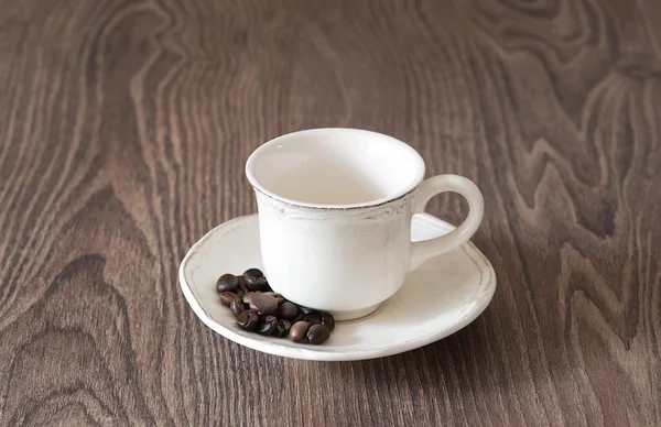 Lege koffie cup op de houten — Stockfoto