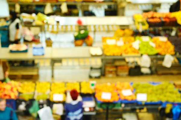 Blurred photo of a market — Stock Photo, Image