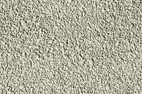 Parede pequenas pedras textura — Fotografia de Stock