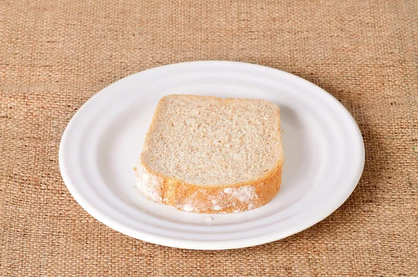 Gesneden brood op zak — Stockfoto