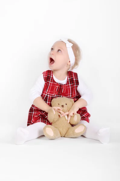 Young girl poses for a picture on white — Stock Photo, Image