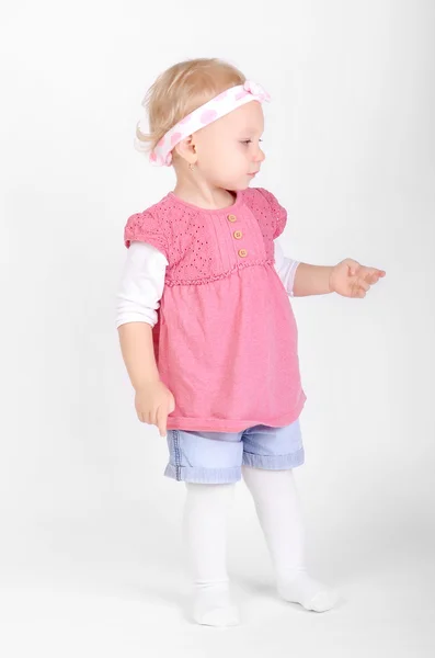 Young girl poses for a picture on white — Stock Photo, Image