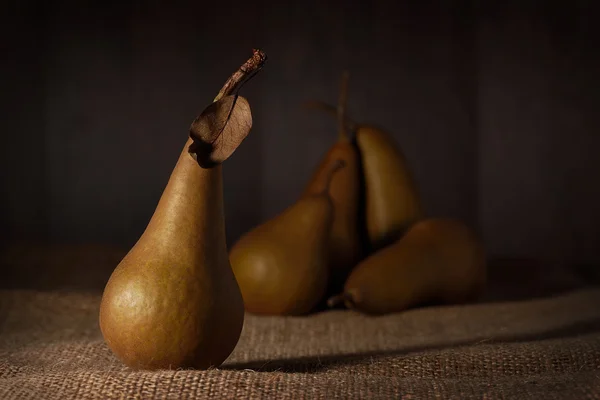 Fresh pears on sackcloth background — Stock Photo, Image