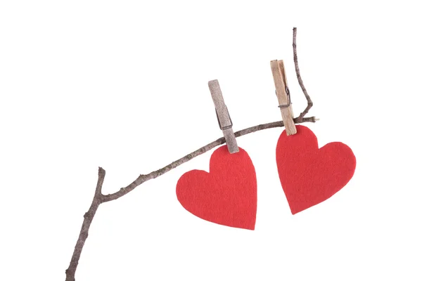 Red hearts on a dry branch — Stock Photo, Image