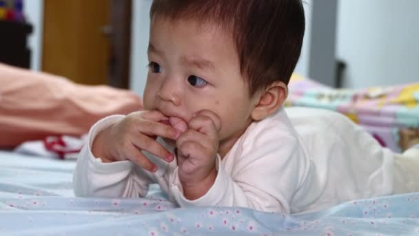 Portrait Month Asian Chinese Baby Boy Lying His Stomach Bed — Stock Video