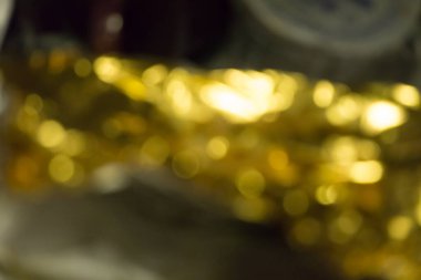 Altın ve sarı soyut bokeh arkaplanı