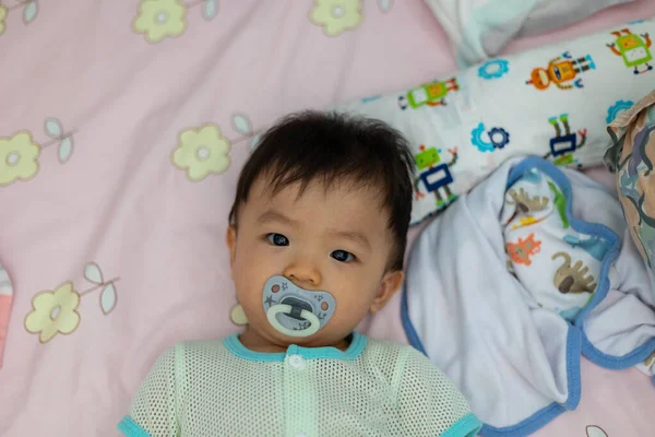 Portrait Image Cute Baby Boy Sucking Pacifier Lying Bed — Stock Photo, Image