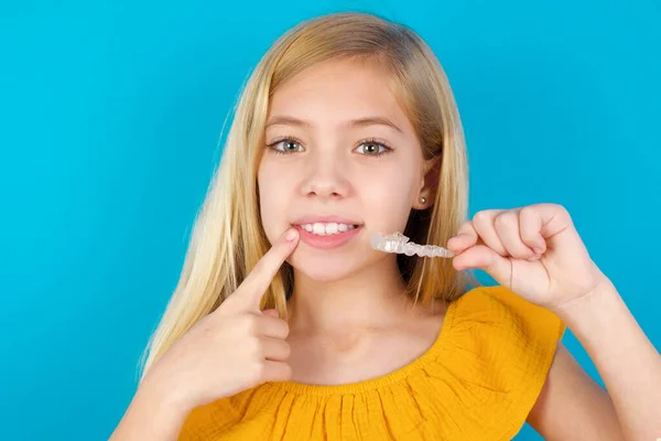 Little Girl Holding Invisible Aligner Pointing Her Perfect Straight Teeth — Stock Photo, Image