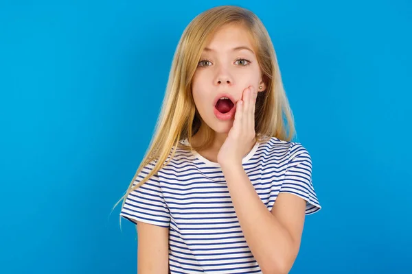 Shocked Caucasian Girl Wearing Striped Shirt Blue Wall Looks Great — Stock Photo, Image