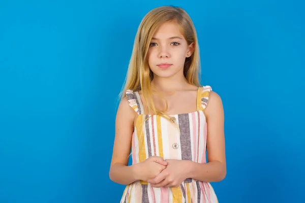 Photo Cheerful Confident Caucasian Kid Girl Wearing Dress Blue Wall — Stock Photo, Image