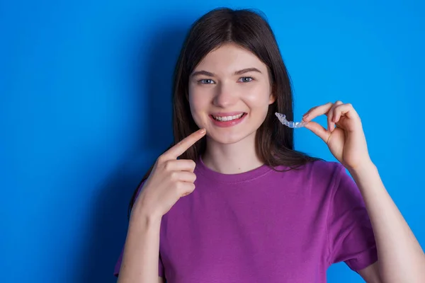 Young Woman Holding Invisible Aligner Pointing Her Perfect Straight Teeth — Stock Photo, Image