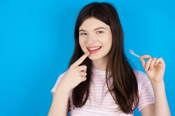 Young Brunette Woman Holding Invisible Aligner Pointing Her Perfect Straight — Stock Photo, Image