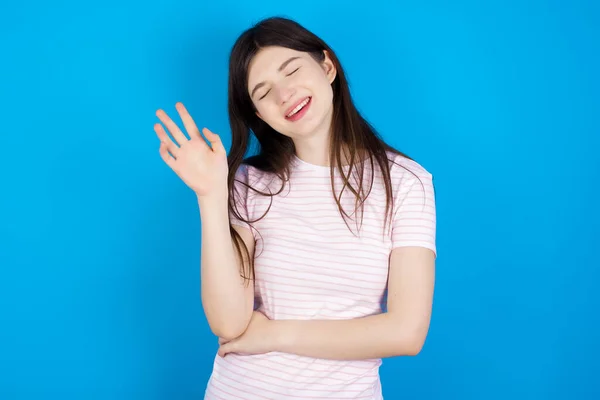 Overjoyed Successful Young Brunette Woman Raises Palm Closes Eyes Joy — Stok fotoğraf