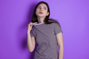 young brunette woman stressed, anxious, tired and frustrated, pulling shirt neck, looking frustrated with problem