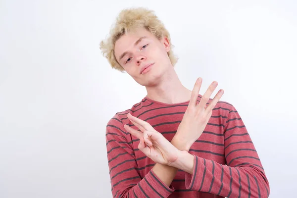 Young Blond Man Showing Pointing Fingers Number Six While Smiling — Φωτογραφία Αρχείου