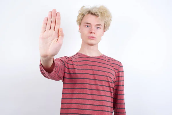 Young Blond Man Doing Stop Sing Palm Hand Warning Expression — Φωτογραφία Αρχείου