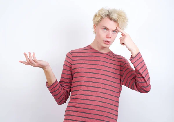 Young Blond Man Confused Annoyed Open Palm Showing Copy Space — Φωτογραφία Αρχείου