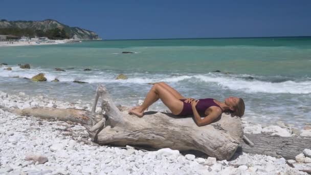 Slow Motion Woman Relaxing White Gravel Beach Turquoise Water Conero — Stock Video