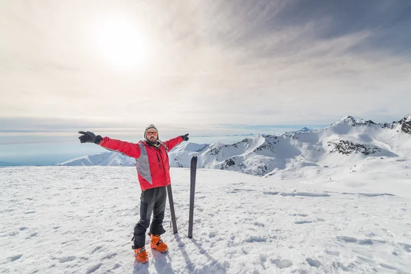 Alpinist with back country ski