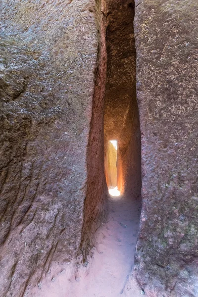 Narrow passage into the rock — Stock Photo, Image