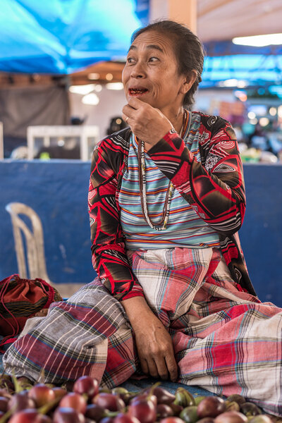 Indonesia: portrait of senior market vendor