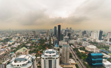 Smog and haze over Bangkok, cityscape from above clipart