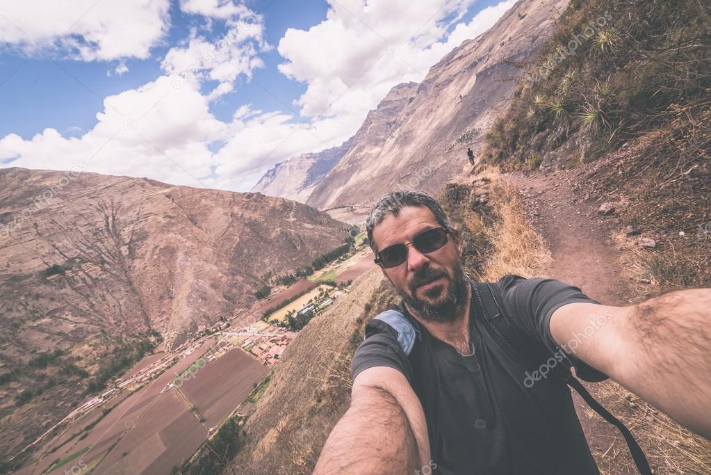 Traveler taking selfie in the Inca's Sacred Valley, Peru