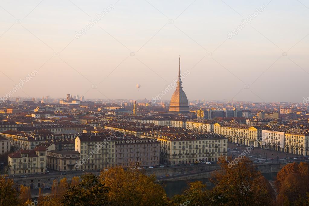 Popular city view of Turin (Torino) from above at sunset