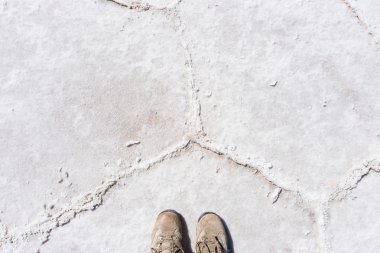 Trekking boots on the Uyuni Salt Flat, Bolivia