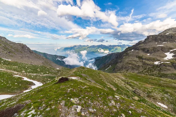 Glowing alpine valley at sunset from above — Stock Photo, Image