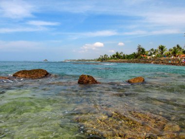 Ocean bay with rocks and transparent water, Sri-Lanka