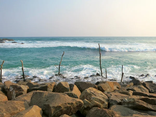 Fishermens sticks at ocean coast in Sri-Lanka — Stock Photo, Image