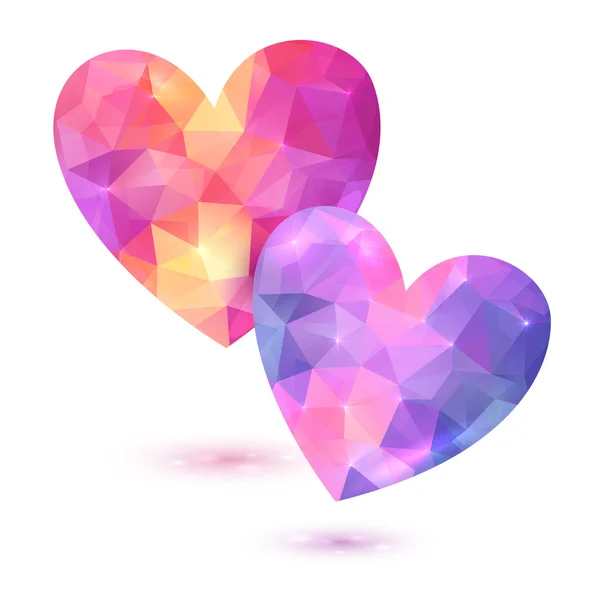 Couple of vector faceted pink hearts — 图库矢量图片