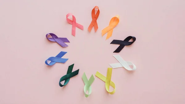 Todas Las Cintas Color Sobre Fondo Rosa Conciencia Del Cáncer —  Fotos de Stock