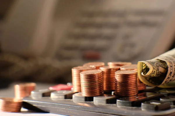 Stacks of gold money coin on black background and concept saving money, business growth strategy of money concept, advertising coins of finance and banking