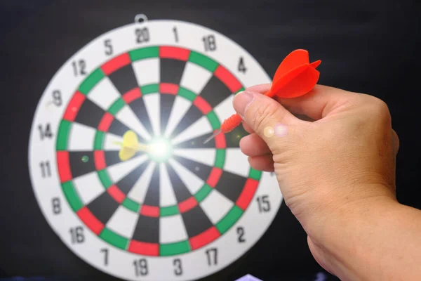 Dart board with target and business growth concept