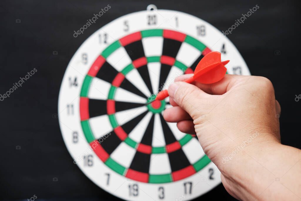 Dart board with target and business growth concept