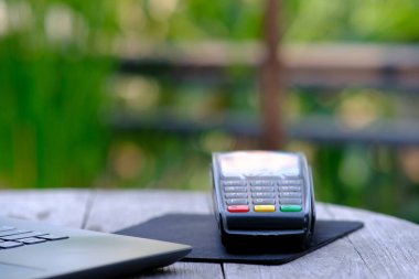 credit card with mobile phone and smartphone on table in cafe