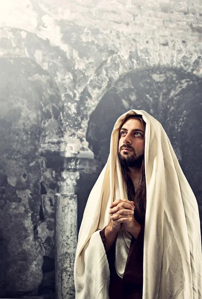 Jesus Christ prays with clasped hands — Stock Photo, Image