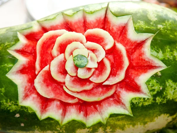 Watermelon decoration with floral carvings. — Stock Photo, Image