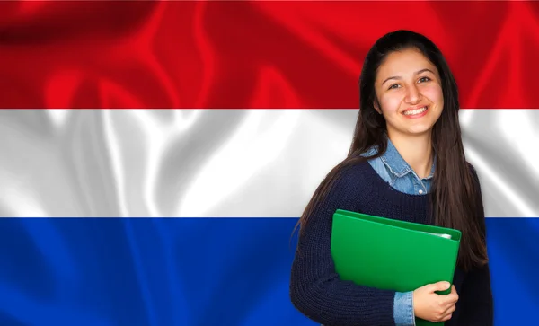 Teen student smiling over Dutch flag — Stock Photo, Image