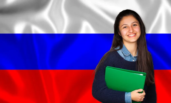 Adolescent étudiant souriant sur drapeau russe — Photo