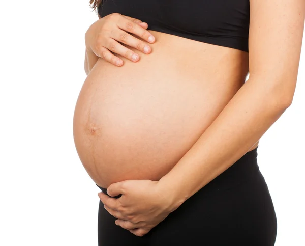 En gravid kvinnas mage. — Stockfoto